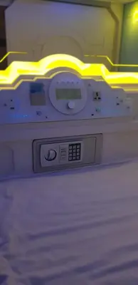 a close up of a nintendo wii game controller at Bestow Capsule Hostel in Kuala Lumpur