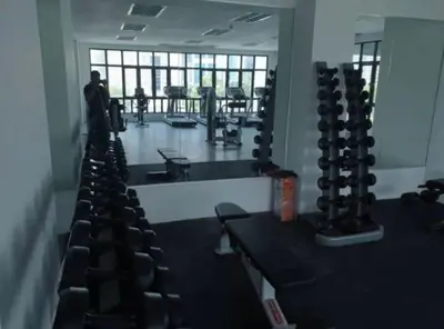 a room with a bunch of chairs in a gym at 3 Bedrooms Short Stays Condo at KLCC in Kuala Lumpur