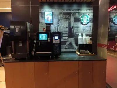a cash counter in a store with a pay phone at City Home Suites Kuala Lumpur City Centre in Kuala Lumpur