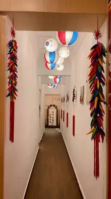 a hallway with colorful decorations on the walls at Fahrenheit88-Korea Theme Bukit Bintang Kuala Lumpur 2R2B 6Pax in Kuala Lumpur