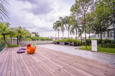 a wooden deck with a bunch of objects on it at Peaceful 3-bedroom with Pool 5 pax - Wangsa Maju in Kuala Lumpur