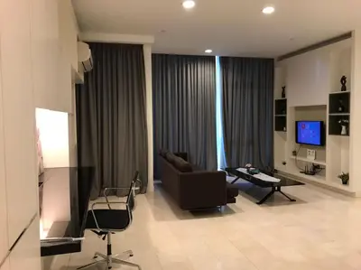 a living room with a couch and a table at Platinum KLCC By Rainbow Suites in Kuala Lumpur