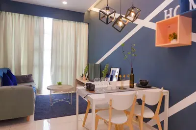 a dining room with blue walls and a table and chairs at Robertson Suites Bukit Bintang with Netflix in Kuala Lumpur