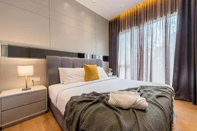 a bedroom with a large bed and a window at Starlight Penthouse 6-12Pax, 600m to Pavilion KL by Verano in Kuala Lumpur