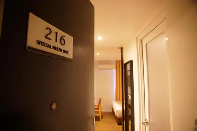 a room with a sign on the side of a wall at Dê MOCCIS Boutique Hotel in Kuala Lumpur