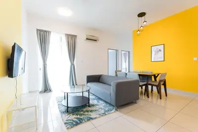 a living room with a couch and a table at TR Residence Lovely 3 BR unit 6pax next to Titiwangsa LRT in Kuala Lumpur