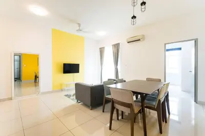 a dining room with a table and chairs at TR Residence Lovely 3 BR unit 6pax next to Titiwangsa LRT in Kuala Lumpur