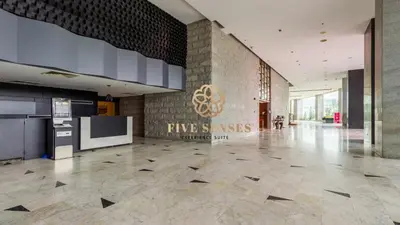 a lobby of a building with a sign on the wall at Dua Sentral Kuala Lumpur, Roam in Kuala Lumpur