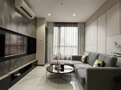 a living room with a couch and a table at 8 Kia Peng KLCC by WSD in Kuala Lumpur