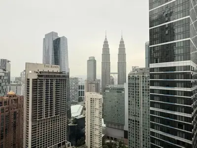 a view of a city skyline with tall buildings at 8 Kia Peng KLCC by WSD in Kuala Lumpur