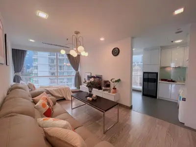 a large living room with a couch and a table at LUX SUITES KL City Pavilion Bukit Bintang with INFINITY POOL in Kuala Lumpur