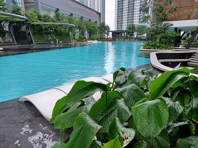 a large swimming pool in a city with buildings at Dsistyle Islamic House in Kuala Lumpur