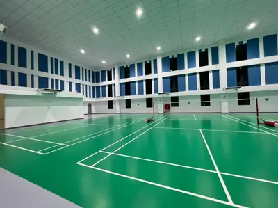 an indoor tennis court with a green court at Dsistyle Islamic House in Kuala Lumpur