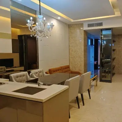 a kitchen and dining room with a table and chairs at Dorsett Residence KL Private Studio apartment in Kuala Lumpur