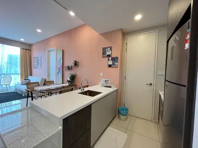 a kitchen with a sink and a refrigerator at The Robertson 2B at Bukit Bintang with Netflix,trx,klcc,pavilion,lalaport in Kuala Lumpur