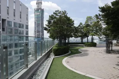 a view from a balcony of a building with a park at MyCrib45*The Robertson KL-B.Bintang in Kuala Lumpur