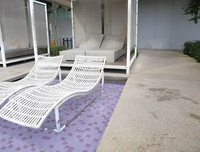 two white chairs sitting on a purple rug at MyCrib45*The Robertson KL-B.Bintang in Kuala Lumpur