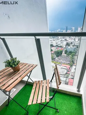 a bench on a balcony with a view of a city at TR Residence WTC Titiwangsa Monorail MRT Station KLCC HKL IJM Bukit Bintang in Kuala Lumpur