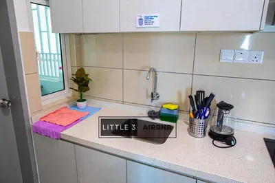 a kitchen with a counter with ailitres arrive sign on it at TR Residence WTC Titiwangsa Monorail MRT Station KLCC HKL IJM Bukit Bintang in Kuala Lumpur