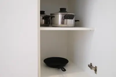 a pot sitting on a shelf in a kitchen at Atmoods - Vortex KLCC in Kuala Lumpur