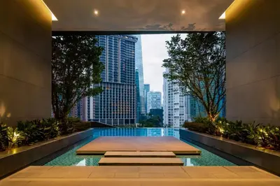 a swimming pool with a view of a city at 8 Kia Peng Residences by Times 8 in Kuala Lumpur