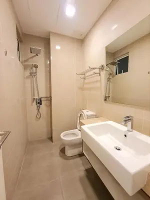 a bathroom with a sink and a toilet at Bukit Bintang KLCC Binjai 8 Premium Soho Apartment by Sarah's Lodge in Kuala Lumpur