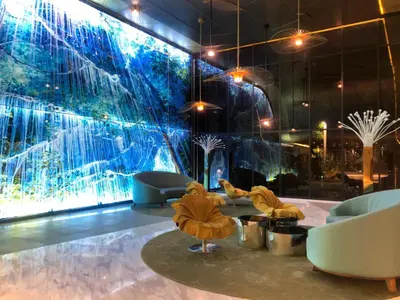 a lobby with a large aquarium in the background at PARC 3 in Cheras, #Sunway Velocity #IKEA #TRX in Kuala Lumpur