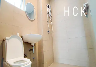 a bathroom with a white toilet and a sink at Titiwangsa Core at TR Residence by HCK in Kuala Lumpur