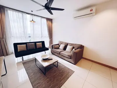 a living room with a couch and a coffee table at [PROMO]Connected train 2 Bedrooms - Above Mall(25) in Kuala Lumpur