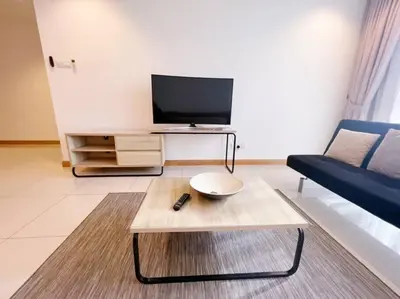 a living room with a couch and a coffee table at [PROMO]Connected train 2 Bedrooms - Above Mall(25) in Kuala Lumpur