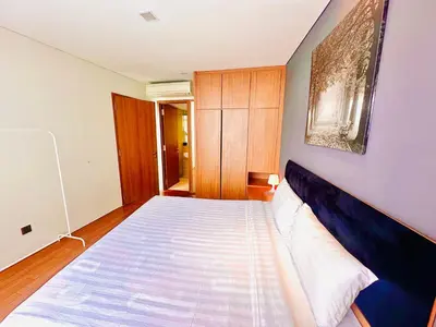 a bedroom with a large bed in a room at near klcc vortex suites by PLUS POIN in Kuala Lumpur