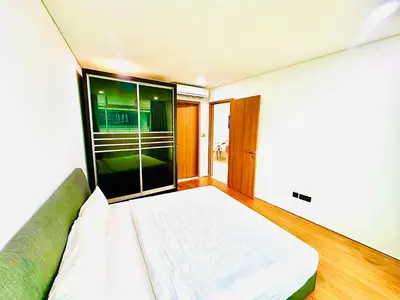 a room with a bed and a large window at near klcc vortex suites by PLUS POIN in Kuala Lumpur
