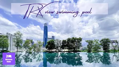 a view of a city with a tall building at Continew Residences TRX Lux Pool View in Kuala Lumpur