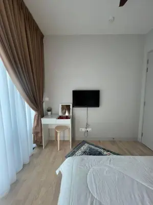 a bedroom with a bed and a desk and a television at Datum Jelatek linked LRT and MALL with Netflix -Disney -WashDryer in Kuala Lumpur