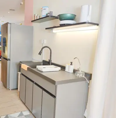 a kitchen with a sink and a refrigerator at SuperNova Bangsar South Mid Valley Universiti Malaya in Kuala Lumpur