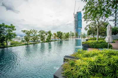 a swimming pool in the middle of a city at Continew Residence KL CoBNB in Kuala Lumpur