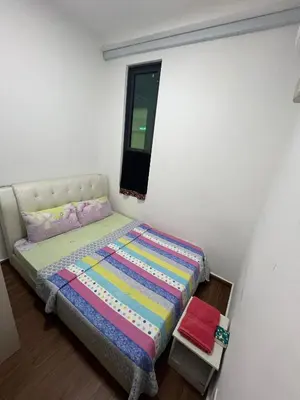 a small bedroom with a bed and a window at KLVIEW LEGASI KG BARU in Kuala Lumpur