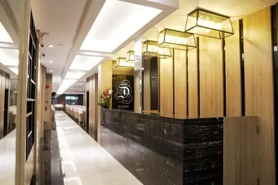 a corridor of a hotel lobby with a long hallway at D Loft Hotel in Kuala Lumpur