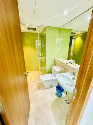 a bathroom with a toilet and a sink at KLCC vortex apartment suites Kuala Lumpur in Kuala Lumpur