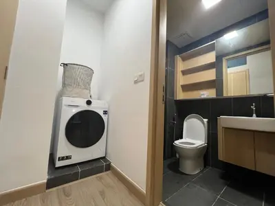 a small bathroom with a toilet and a sink at Colony ( Wisma Infinitum ) in Kuala Lumpur