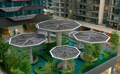an aerial view of a garden with tables on a building at Arte Plus AMPANG by Zzzayn in Batu Empat