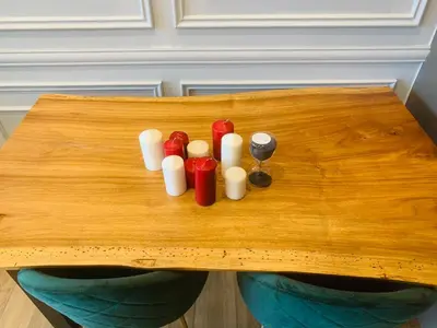 a wooden table with a group of pills on it at Ceylonz Suites by ROOMY in Kuala Lumpur