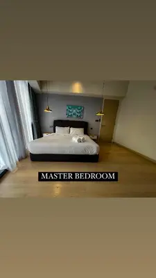 a bedroom with a large bed in a room at STAR RESIDENCE KLCC in Kuala Lumpur