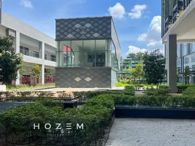 a building with a glass facade in a city at SBR2B Hozem KL1305 Apartment Old Klang Road in Kuala Lumpur