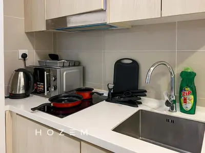 a kitchen with a sink and a stove top oven at SBR2B Hozem KL1305 Apartment Old Klang Road in Kuala Lumpur