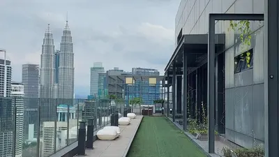a view of a city skyline from a building at Anggun Platinum Suites in Kuala Lumpur