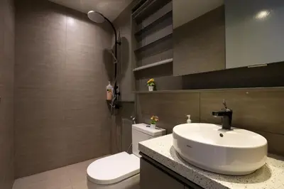 a bathroom with a sink and a toilet at ExpressionZ Suites KLCC by EC in Kuala Lumpur