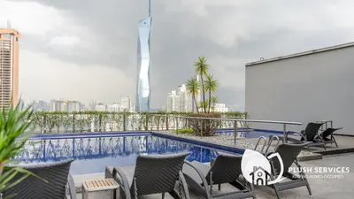 a view of the city from the balcony of a building at Fairlane Residences by Plush in Kuala Lumpur
