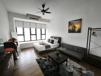 a living room with a couch and a bed at Ceylonz Suites Bukit Bintang I HomeBrickz in Kuala Lumpur
