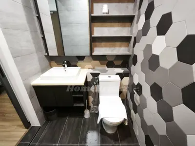 a bathroom with a toilet and a sink at Ceylonz Suites Bukit Bintang I HomeBrickz in Kuala Lumpur